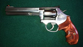 Quality Larry's Smith & Wesson Revolver with Badger Rosewood Finger Groove Grips